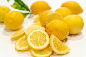 yellow lemon fruits on white surface - ways to use lemon
