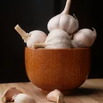eating raw garlic is one of the natural remedies for coughs and colds