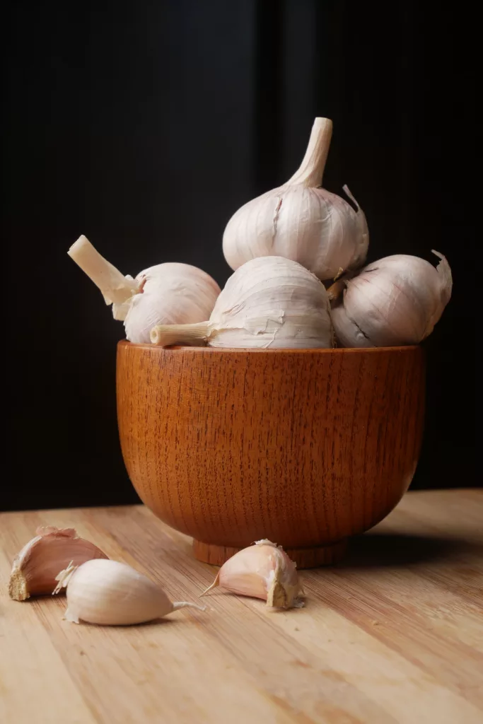 eating raw garlic is one of the natural remedies for coughs and colds