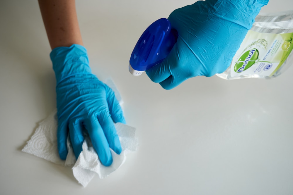 Home Remedies for Allergies: Natural Tips for Managing Allergy Symptoms 4 person in blue gloves holding white textile