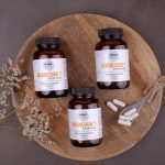 Home 11 three bottles of magnesum on a wooden plate