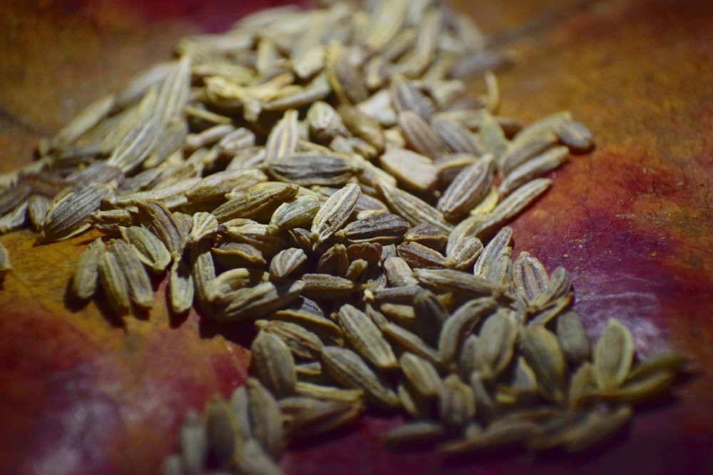 Caraway Seeds: Health Benefits, Uses, and Nutrition Guide 2 brown and green leaves on brown wooden table | health benefits of caraway seeds